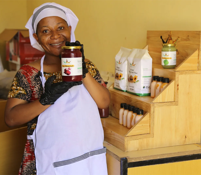 Woman in Awamaki program weaving