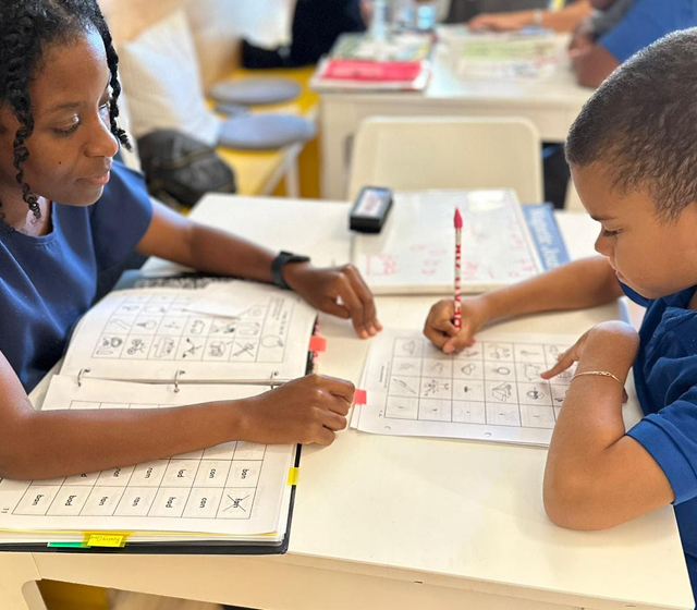 Girls in Kantaya program writing