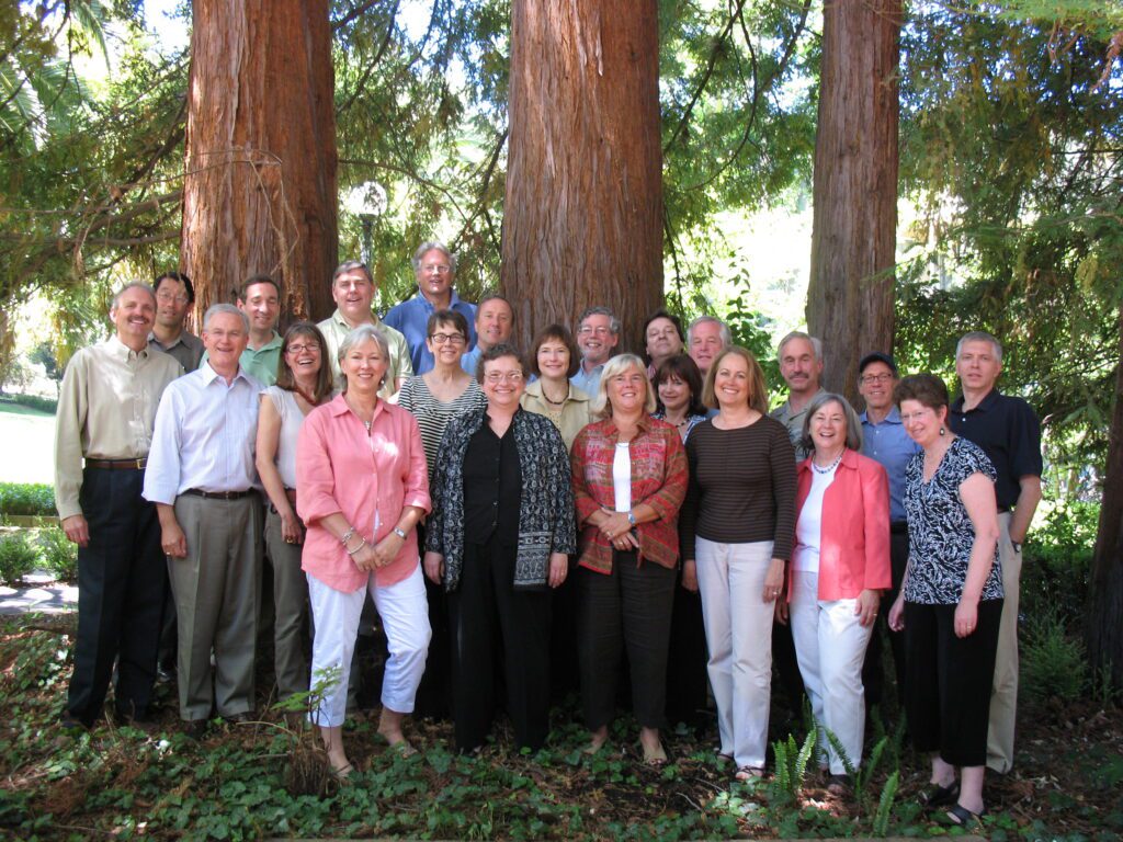 Carole Head and founding members in front of redwoods