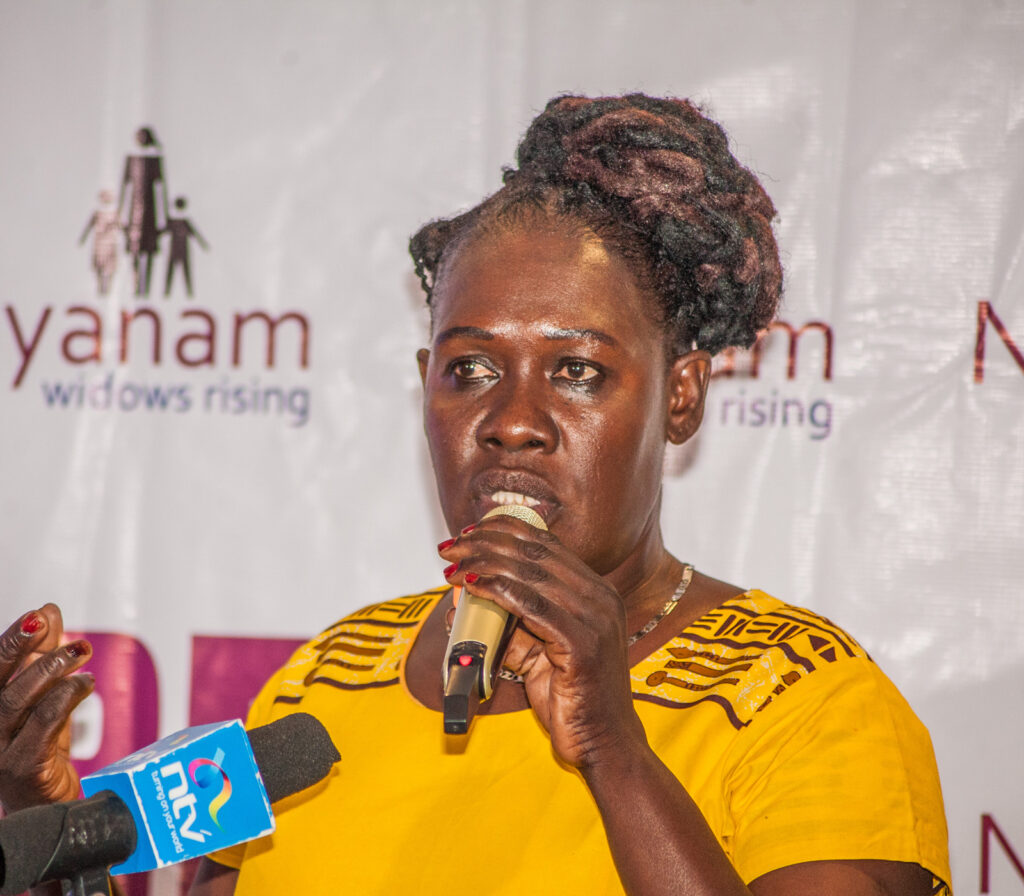 Current Grantees 16 Woman speaking into microphone