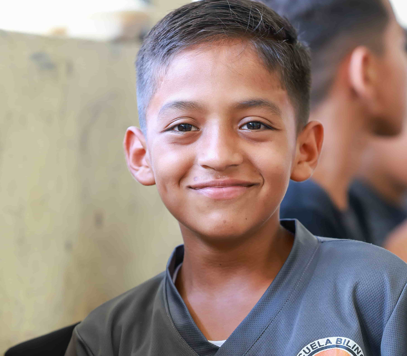 Current Grantees 6 Boy in school uniform